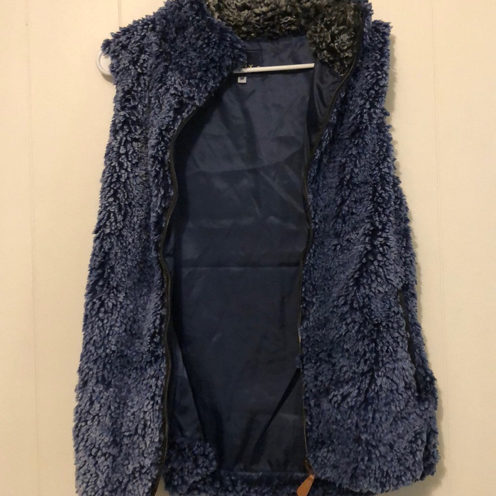 Simple southern Navy blue Sherpa vest!